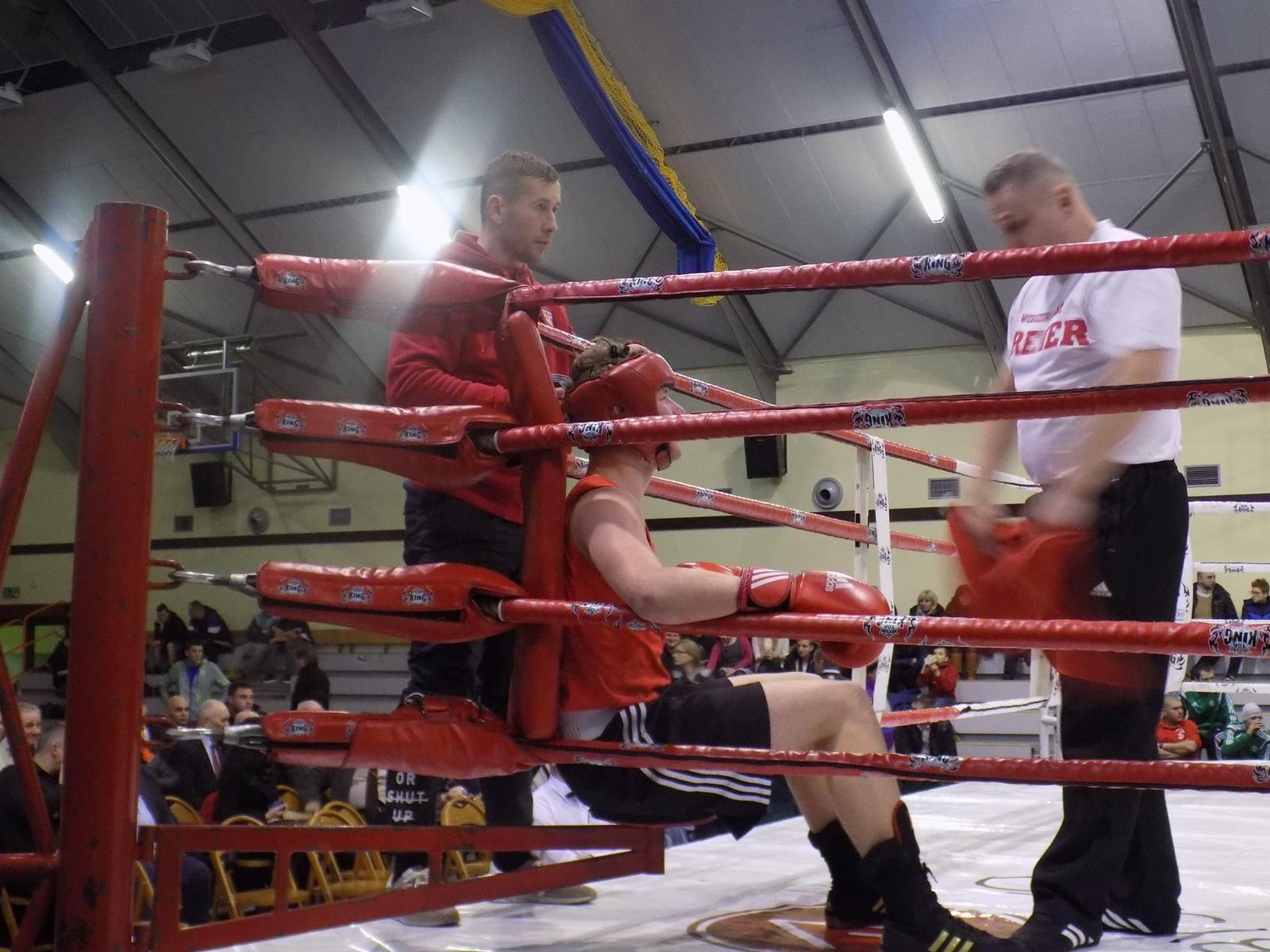 Boxer receiving corner advice during a bout